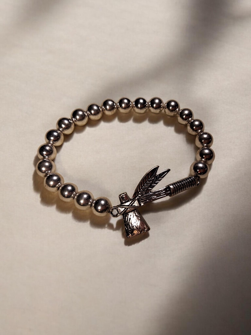 Vintage Silver Beaded Stretchy Bracelet with Feathered Tomahawk